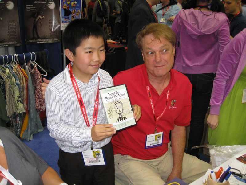 Perry Chen and Bill Plympton, Perry holding Beyond the Forest DVD