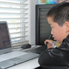Perry Chen drawing animation using a tablet and laptop